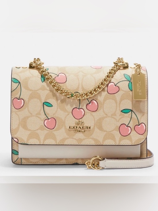 Coach Handbags - NWT Coach Klare Crossbody Bag With Heart Cherry Print